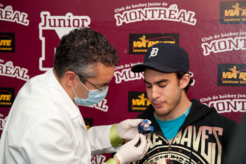 Pourquoi dois-je porter un protecteur buccal lors d'un sport de contact? - Francis Migneault d.d.